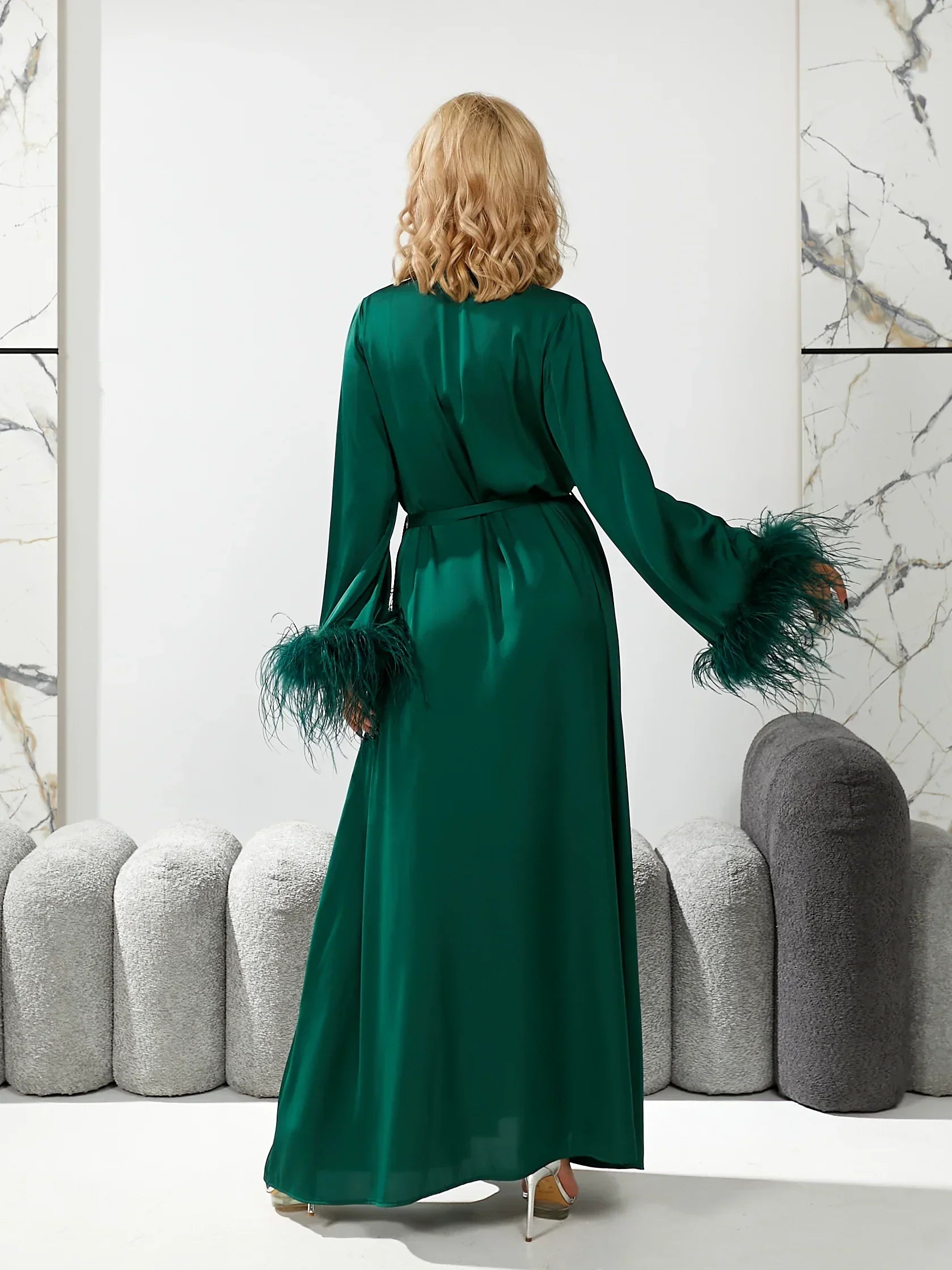 Emerald green silk bridal robe with feather-trimmed sleeves, perfect for wedding morning