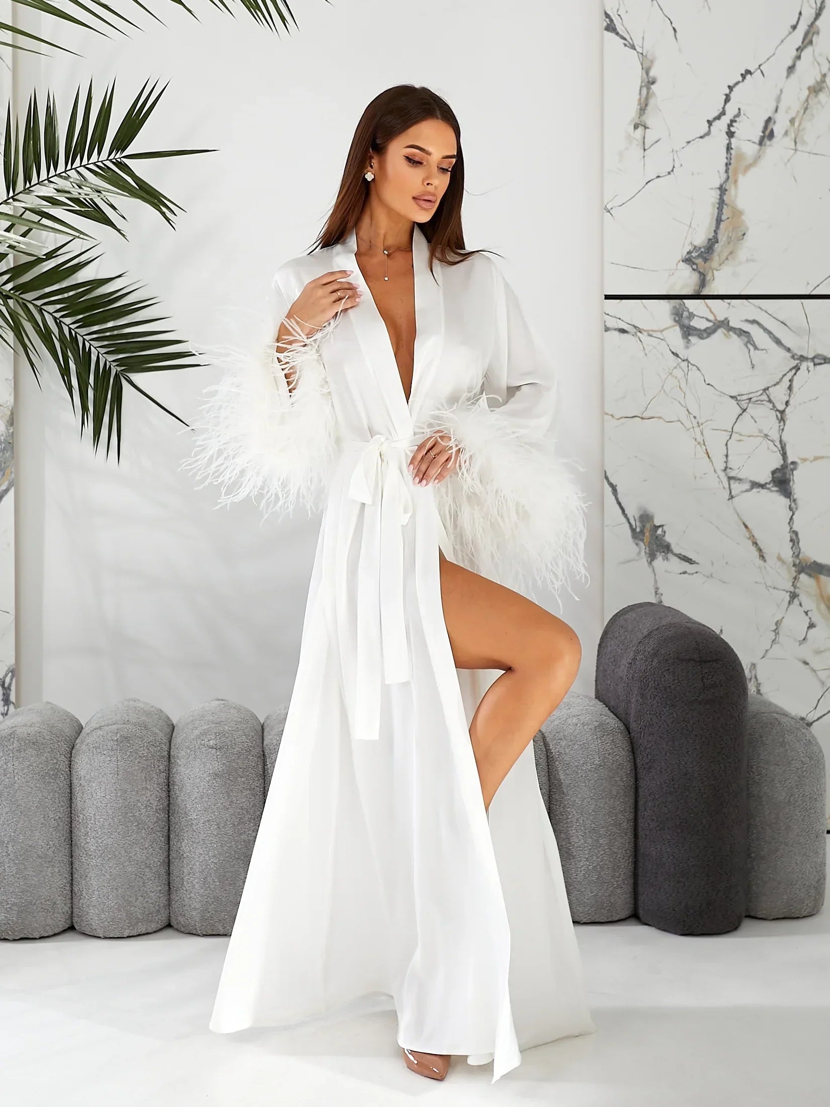 White silk bridal robe with feather trim, perfect for wedding morning, elegant modern setting