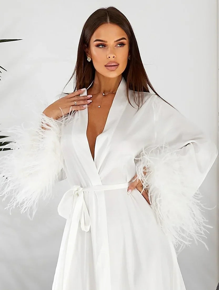 White silk bridal robe with feather cuffs, perfect for wedding morning elegance
