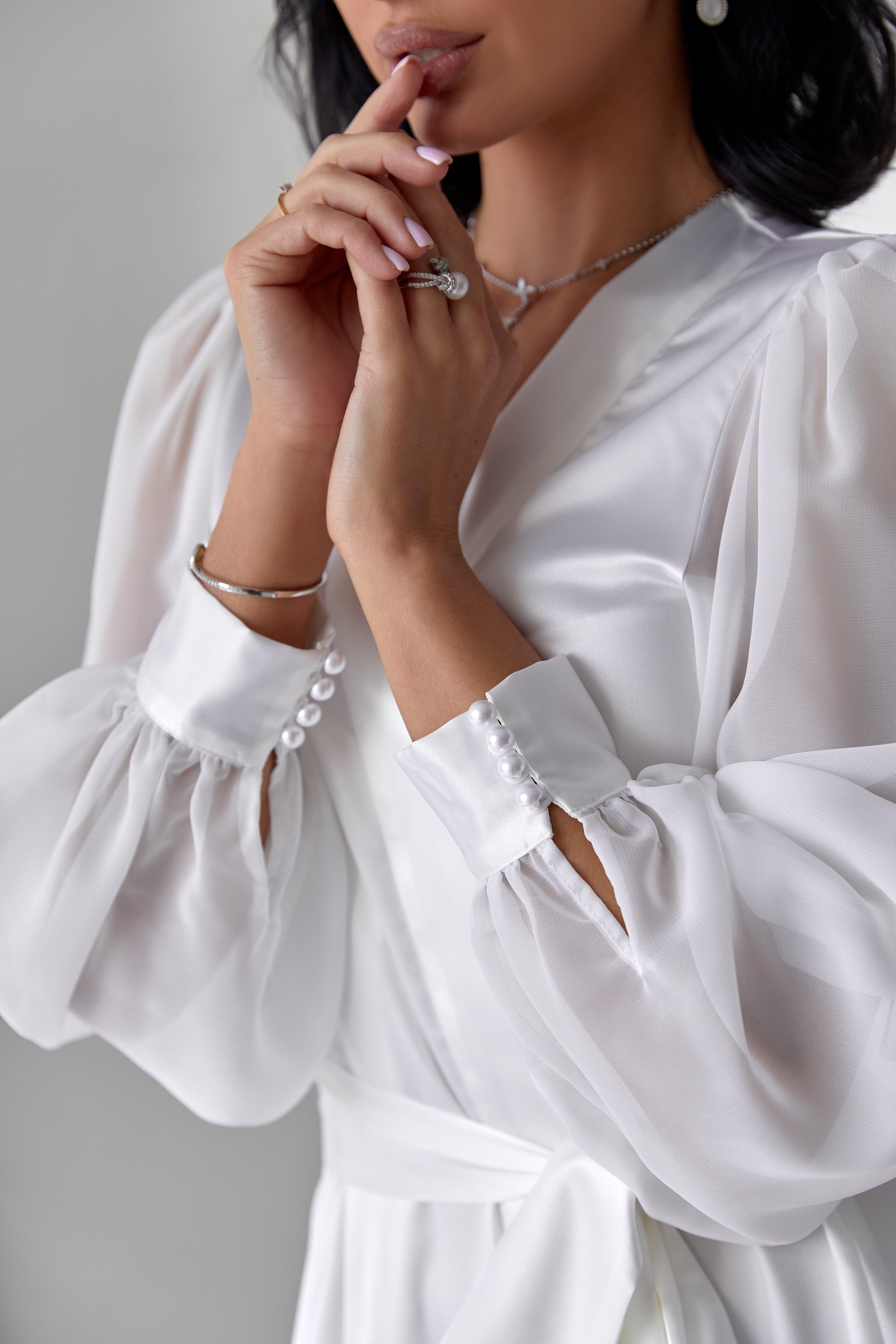 White silk bridal robe with sheer lace sleeves, perfect for wedding morning.