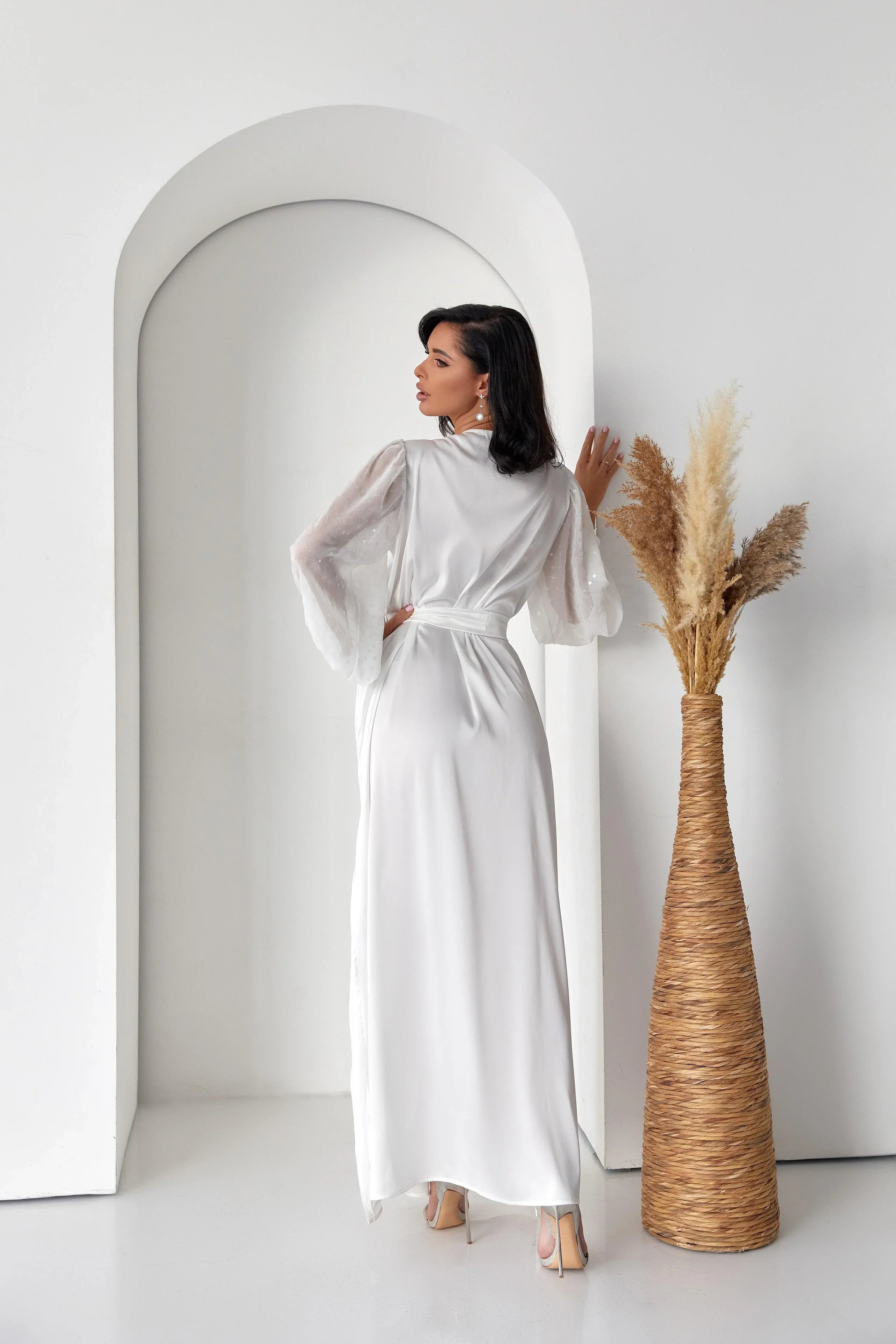 White silk bridal robe with sheer lace sleeves, ideal for wedding morning