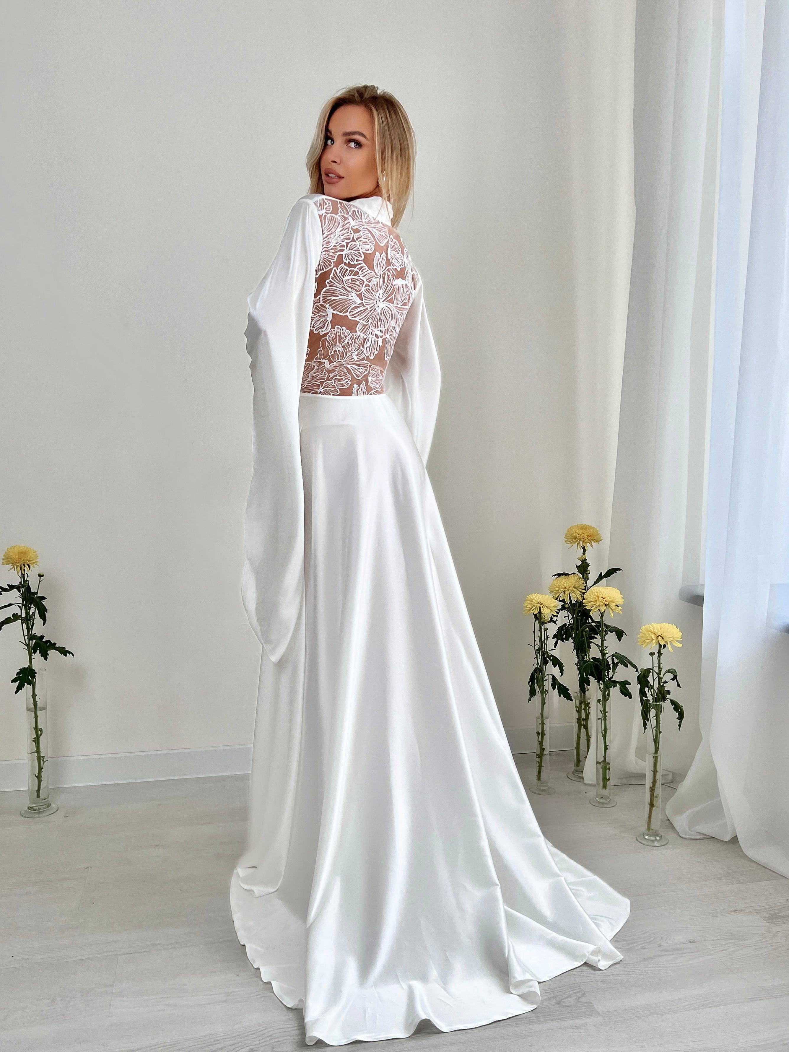 Ivory silk bridal robe with sheer lace back, perfect for wedding morning elegance