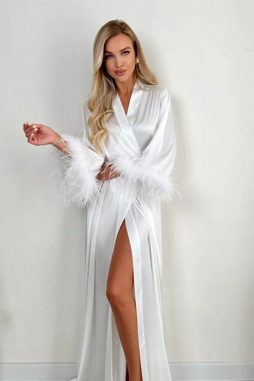 White silk bridal robe with feathered sleeves, perfect for wedding morning elegance
