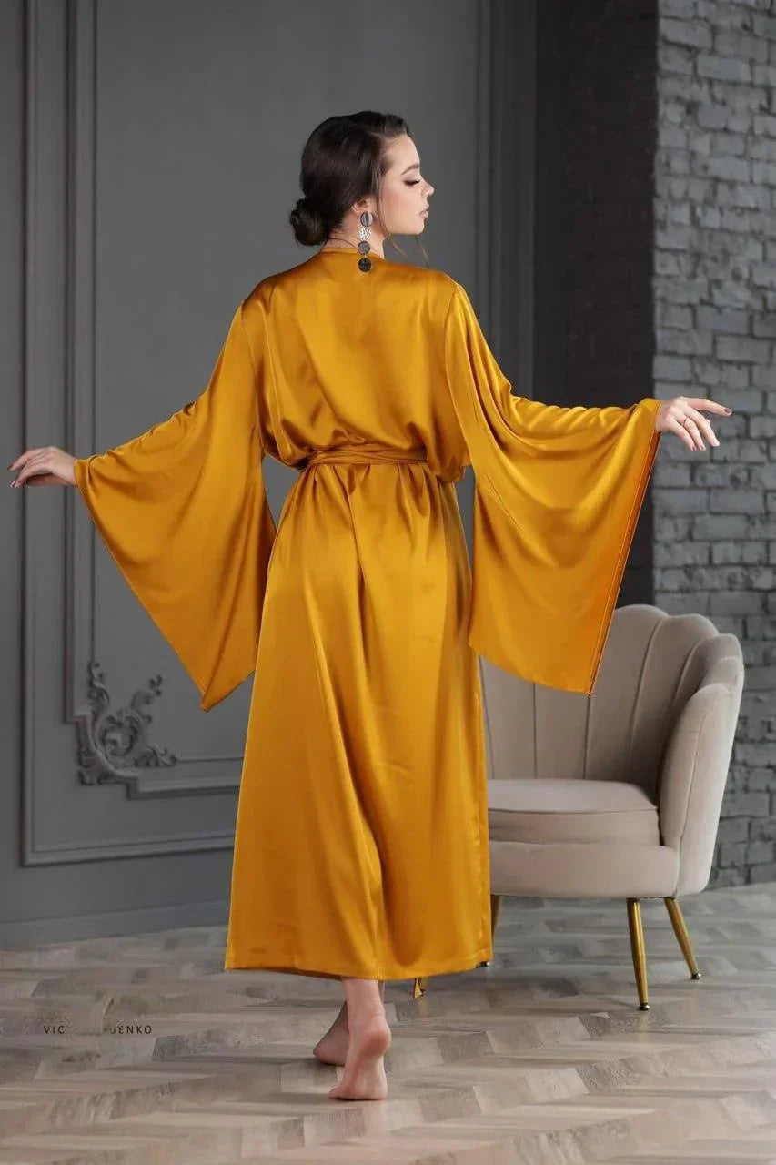 Gold silk bridal robe with wide sleeves, perfect for wedding morning preparation