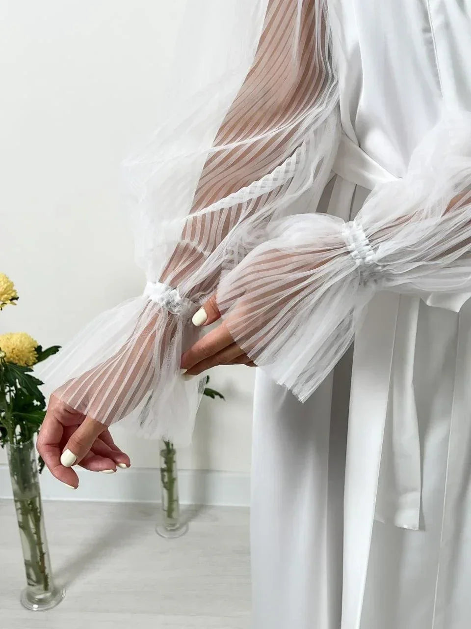 White sheer lace bridal robe with pleated sleeves, perfect for wedding morning style.