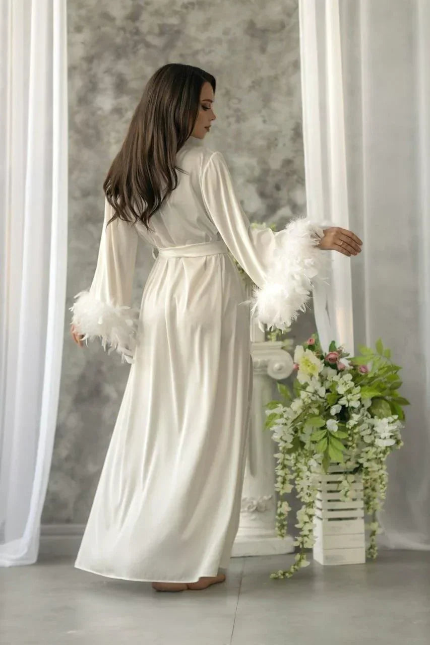 Ivory silk bridal robe with feather cuffs, perfect for wedding morning elegance