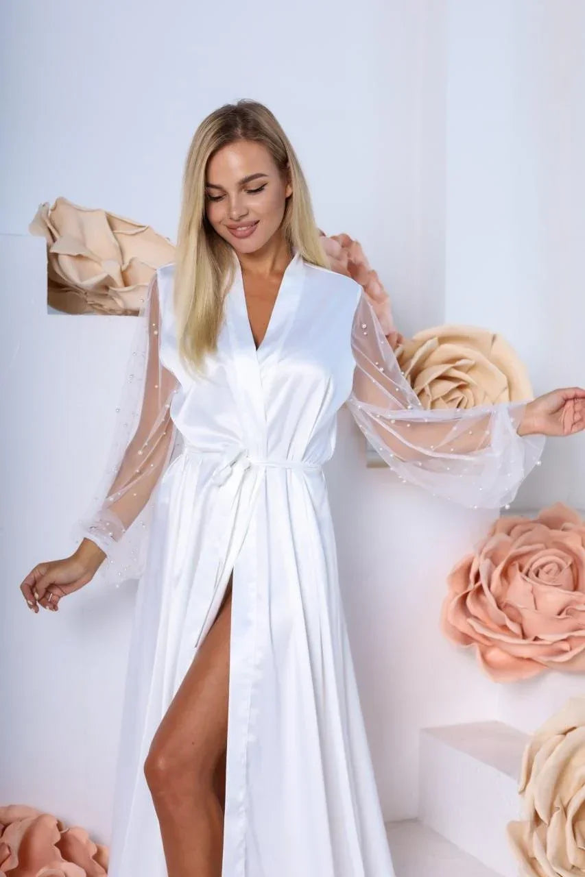 White silk bridal robe with sheer lace sleeves, perfect for wedding morning
